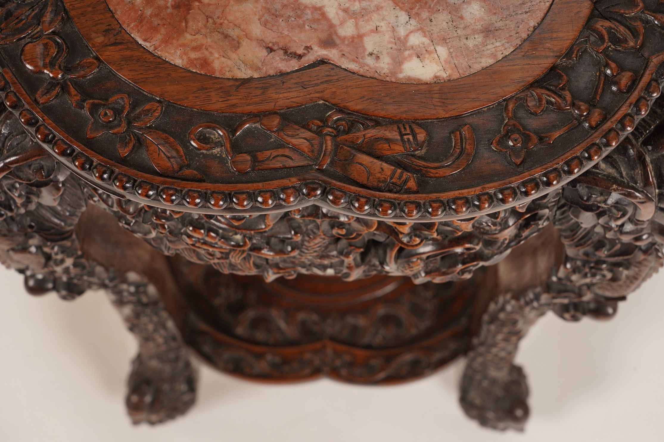 A Chinese hongmu and marble ‘dragon’ jardiniere stand, late 19th century